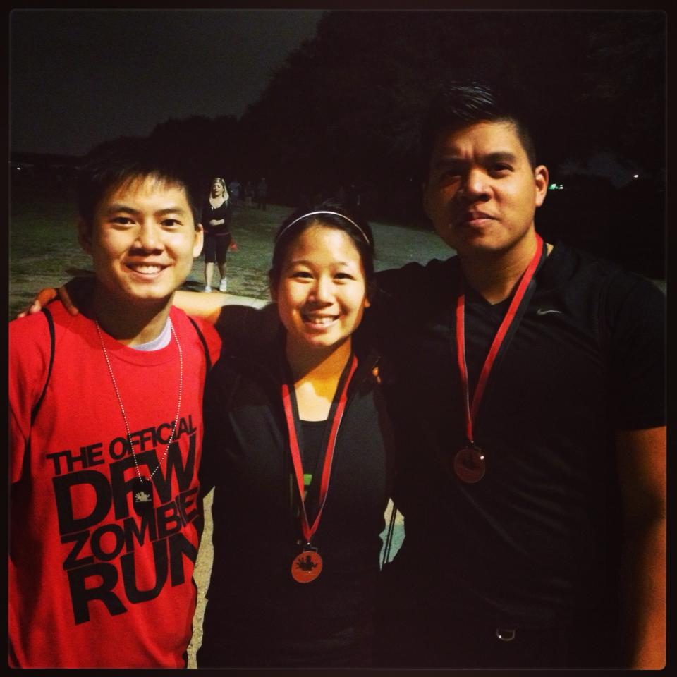 Showing off our medals and t-shirts