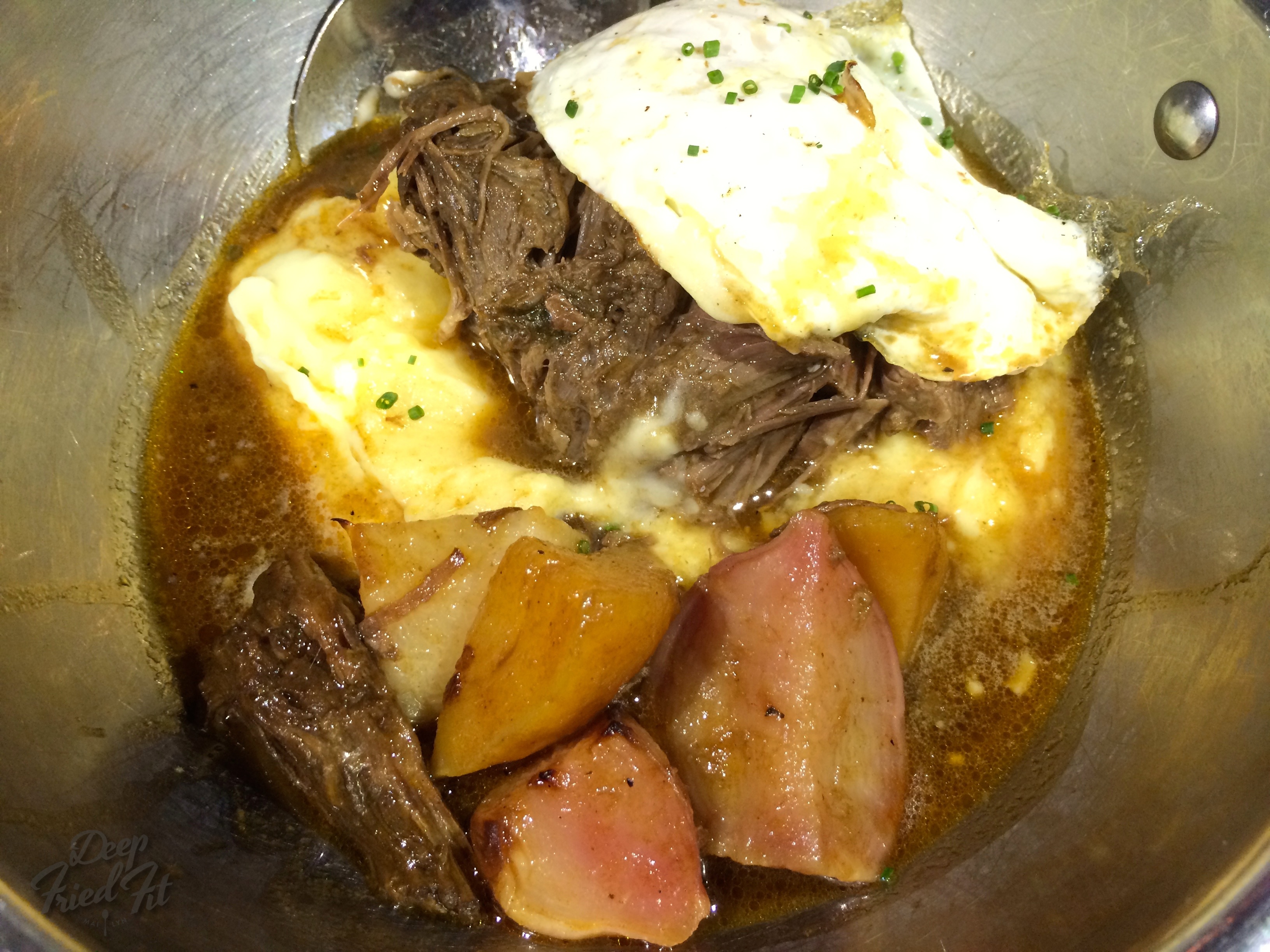 Slow Cooked Beef Shoulder over Yukon potatoes and root veggies.